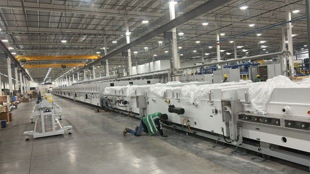 Coating line equipment in an industrial glass facility